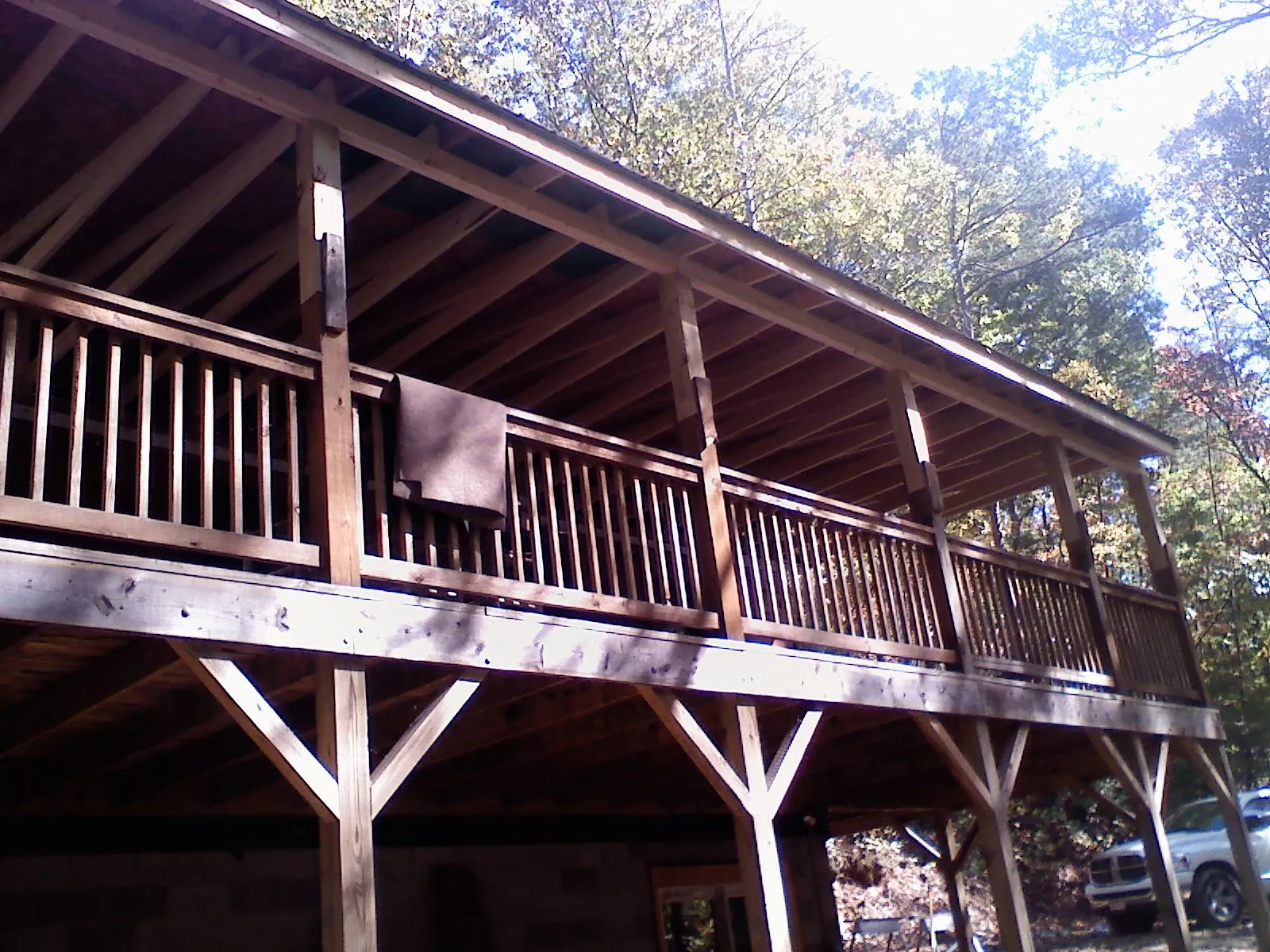 Timber framing under a new elevated porch and deck — Roof Leak Repair in Hamlin by Roofing Brothers